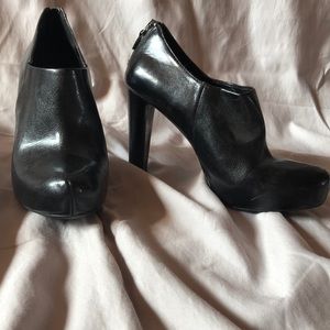 Black leather Franco Sarto zip up back heels